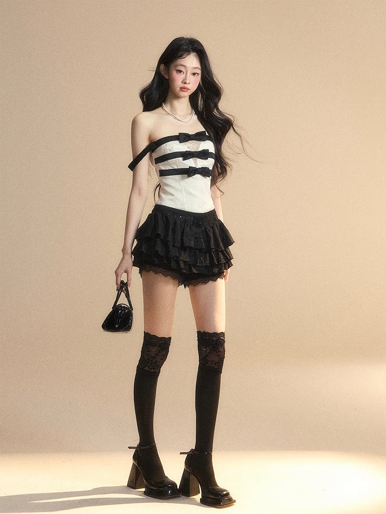 蝶結びのディテール、パッチ、レース、魅力的なストラップレストップ、アプリコットネックライン