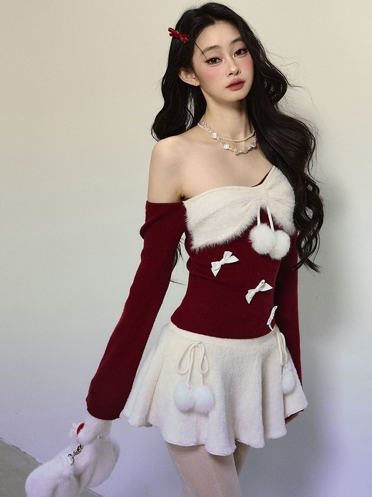 Strickoberteil mit asymmetrischem Ausschnitt und roter Schleife