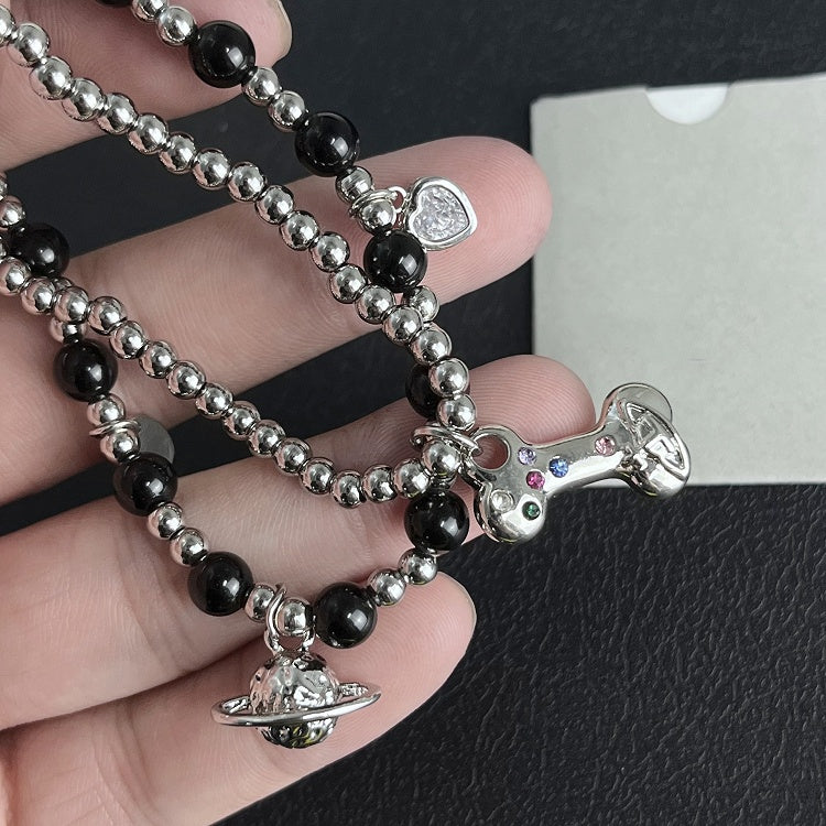 White/Black/Red Saturnand Bone Charm Beaded Bracelet