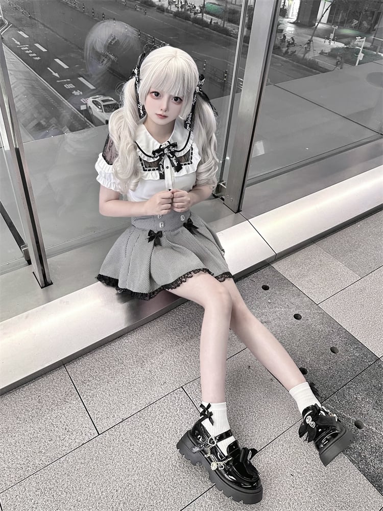 アクセント ジライケイ グレー 千鳥格子 蝶結び レーストリム ラインストーン 装飾 スコート