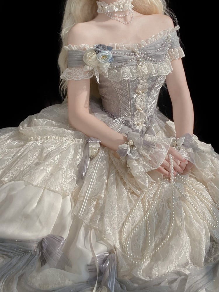 ダスティブルーのリボン結びクリーミーなリストカフス