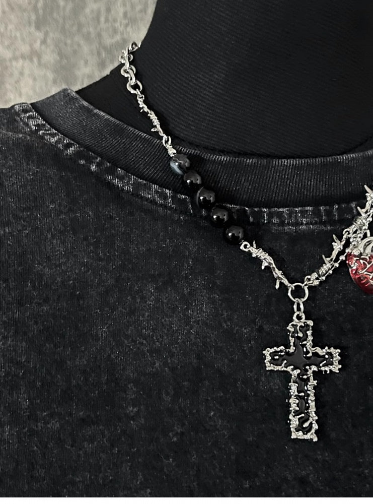 Silberne Dornenhalskette mit Kreuz- und Herzanhänger
