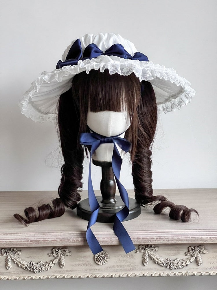 Süßer Lolita-Hut mit weißem Spitzenbesatz und dunkelblauer Schleife