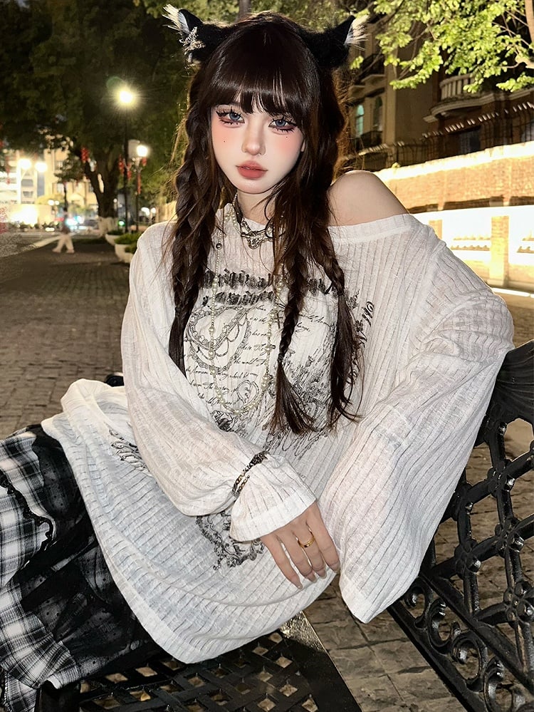 Schwarz/weißes, locker sitzendes, bedrucktes Oberteil mit asymmetrischem Ausschnitt