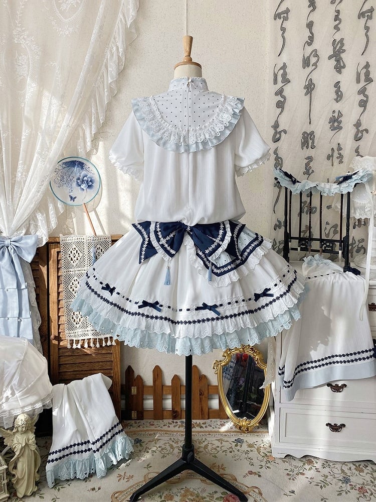 Blue Tassel Train White with Decorations Bow Dark