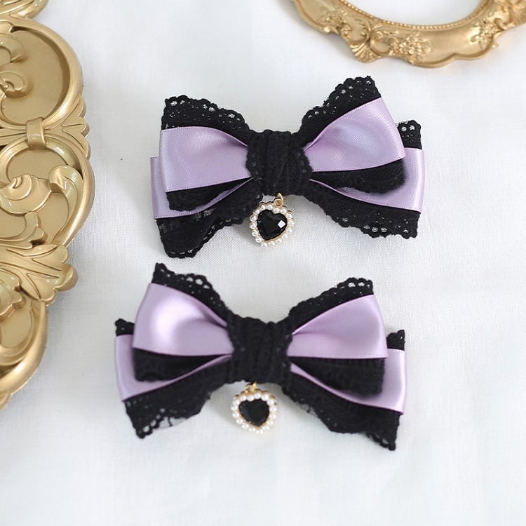 A Pair of Black & Purple Bowknot Lace Hairclips With Heart Charms