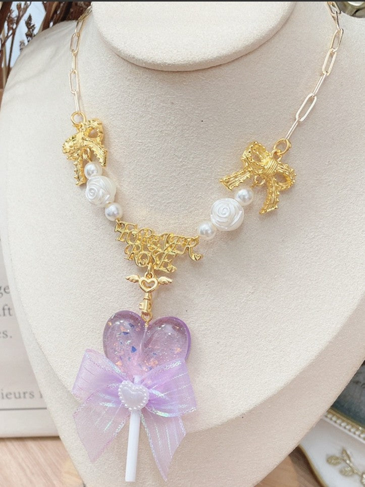 Halskette Bowknot verziert Anhänger gelb/rosa/lila Lollipop Perlen und