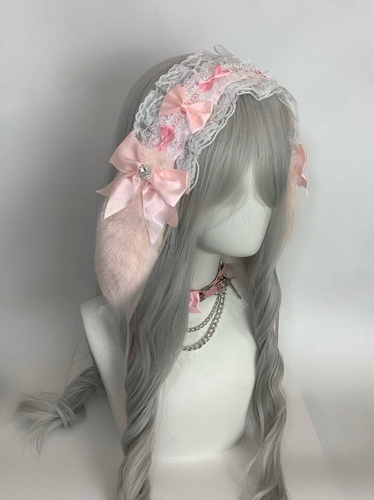 Haarband aus Spitze mit Hasenohren, Schleife und Herz, Strass und Rüschen