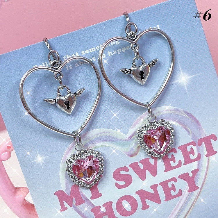 Jirai Kei-Ohrclips mit Pompons und Strassdetails