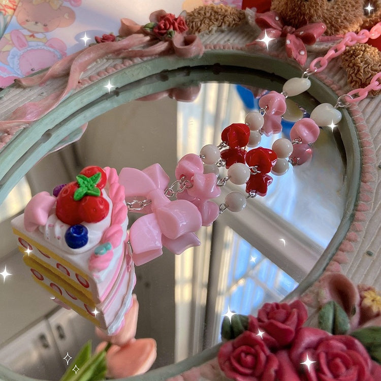 装飾されたピンクのペンダントケーキビーズネックレス蝶結び