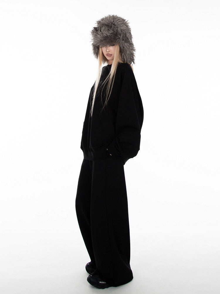 Schwarze, lockere Jogginghose mit weitem Bein und Schlupfdesign