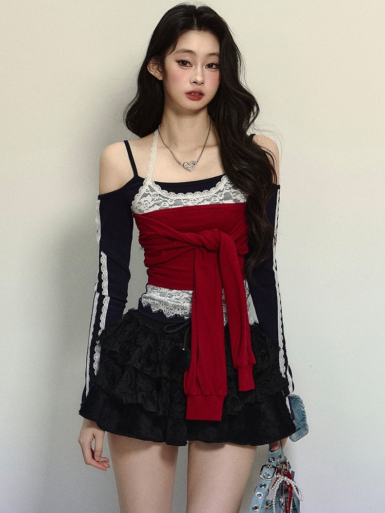 Schwarz-rotes Neckholder-Oberteil mit langen Ärmeln und auffälliger Krawatte