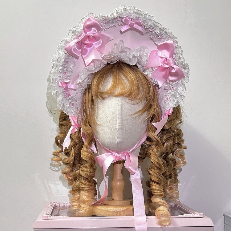 Verzierte Schulhaube mit rosa Schleifen und alter Spitze, Lolita