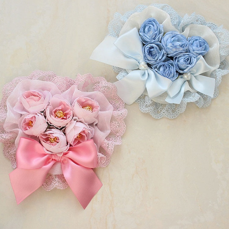 Rosa Haarspange mit floraler Schleife und Spitzenbesatz