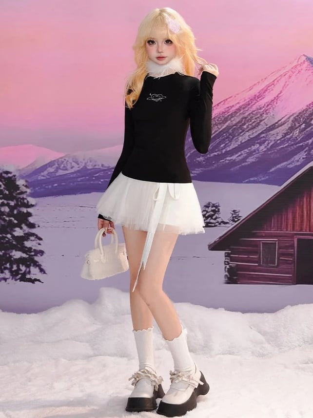 Schwarzes, eng anliegendes Langarm-Top mit Rundhalsausschnitt und Herz-Print