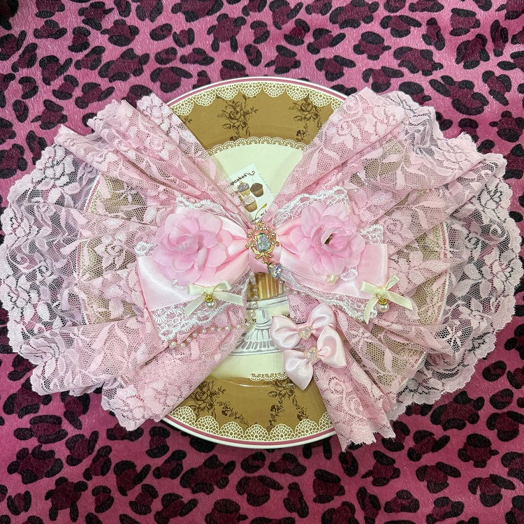 Haarspange mit Blumenanhänger und Strasssteinen in Rosa