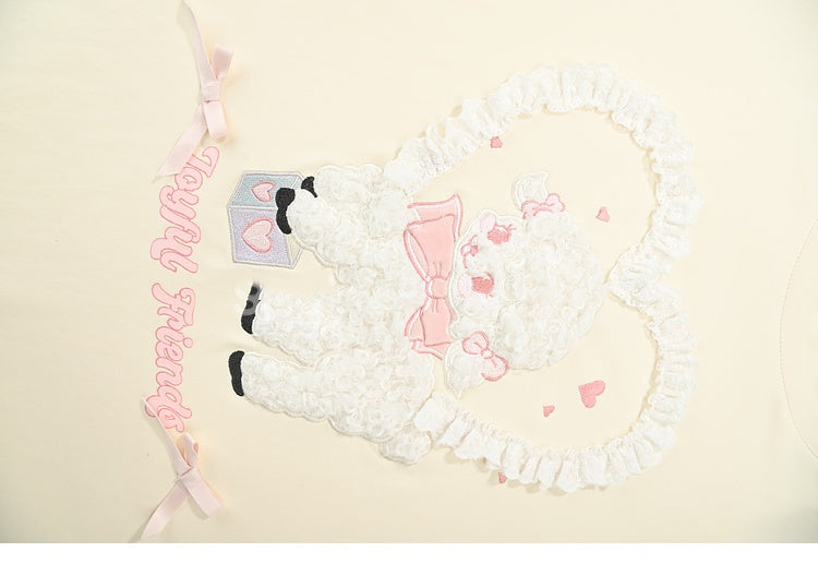 イエローのプラッシュラムアップリケフリルハートルーズTシャツクリーミー