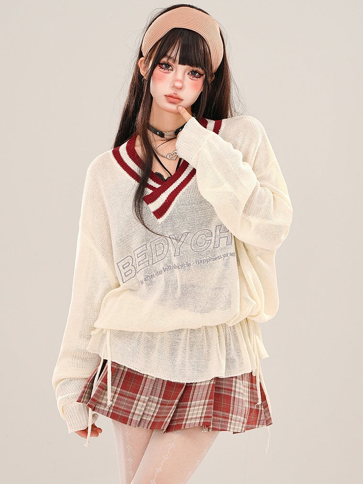 Aprikosenfarbenes, halbtransparentes, lockeres Strickoberteil mit V-Ausschnitt und gerüschter Taille