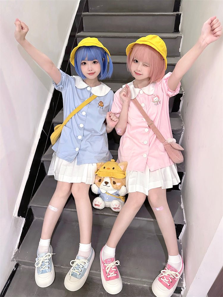 Hellrosa Oberteil mit Puffärmeln und Peter-Pan-Kragen