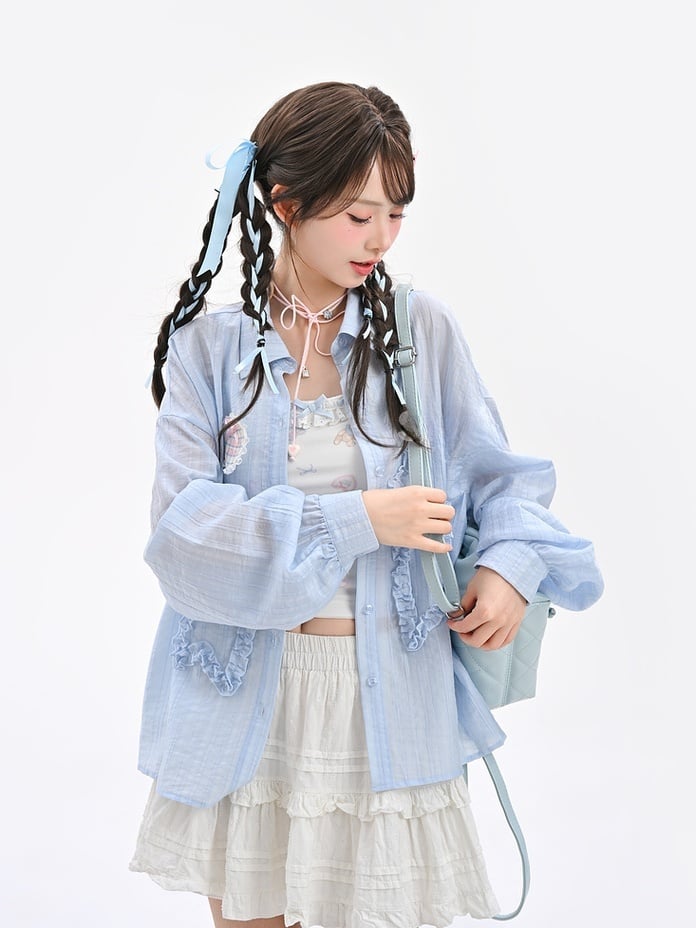 セミシースルーのフリル付き蝶結びアップリケ付きブルーサンプロテクションシャツ