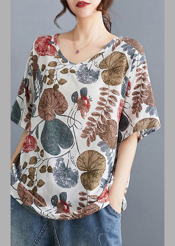 ゆったりとしたプリントの夏の赤いシャツネックテレビ