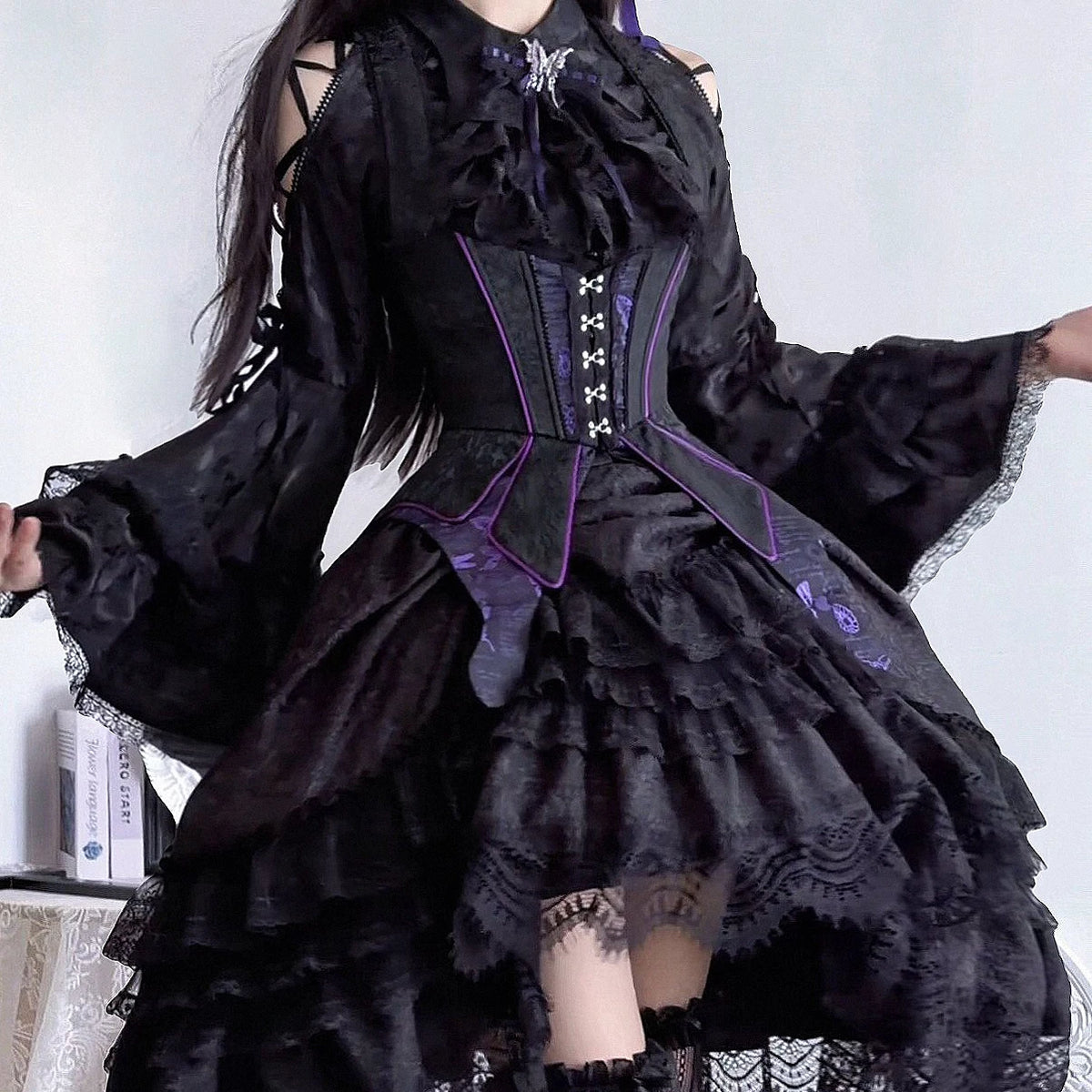 Black Gothic Lolita blouse, purple waistcoat and ruffled skirt