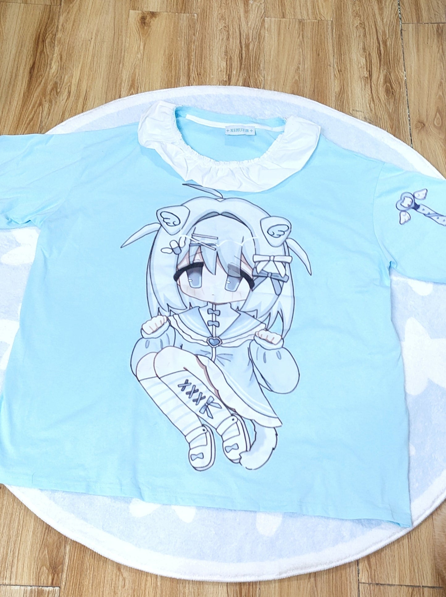 Tops hellblau Angel Illustration Neighborhood