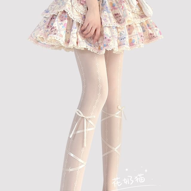 Akzentstrumpfhose mit Schleife, transparent