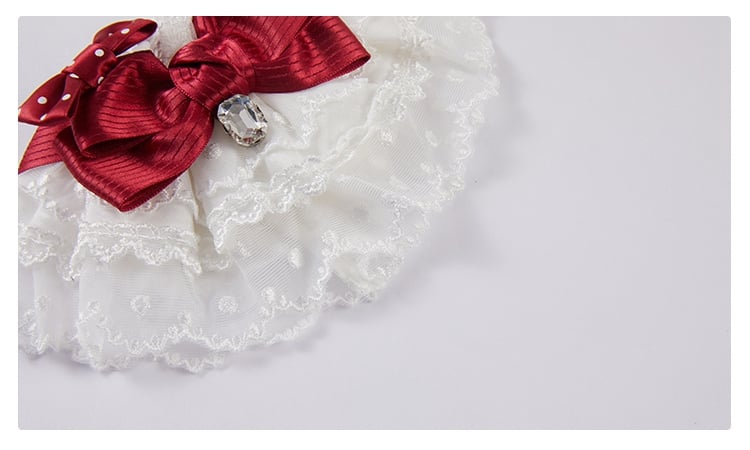 Rosa/weiße Handfesseln mit Schleife