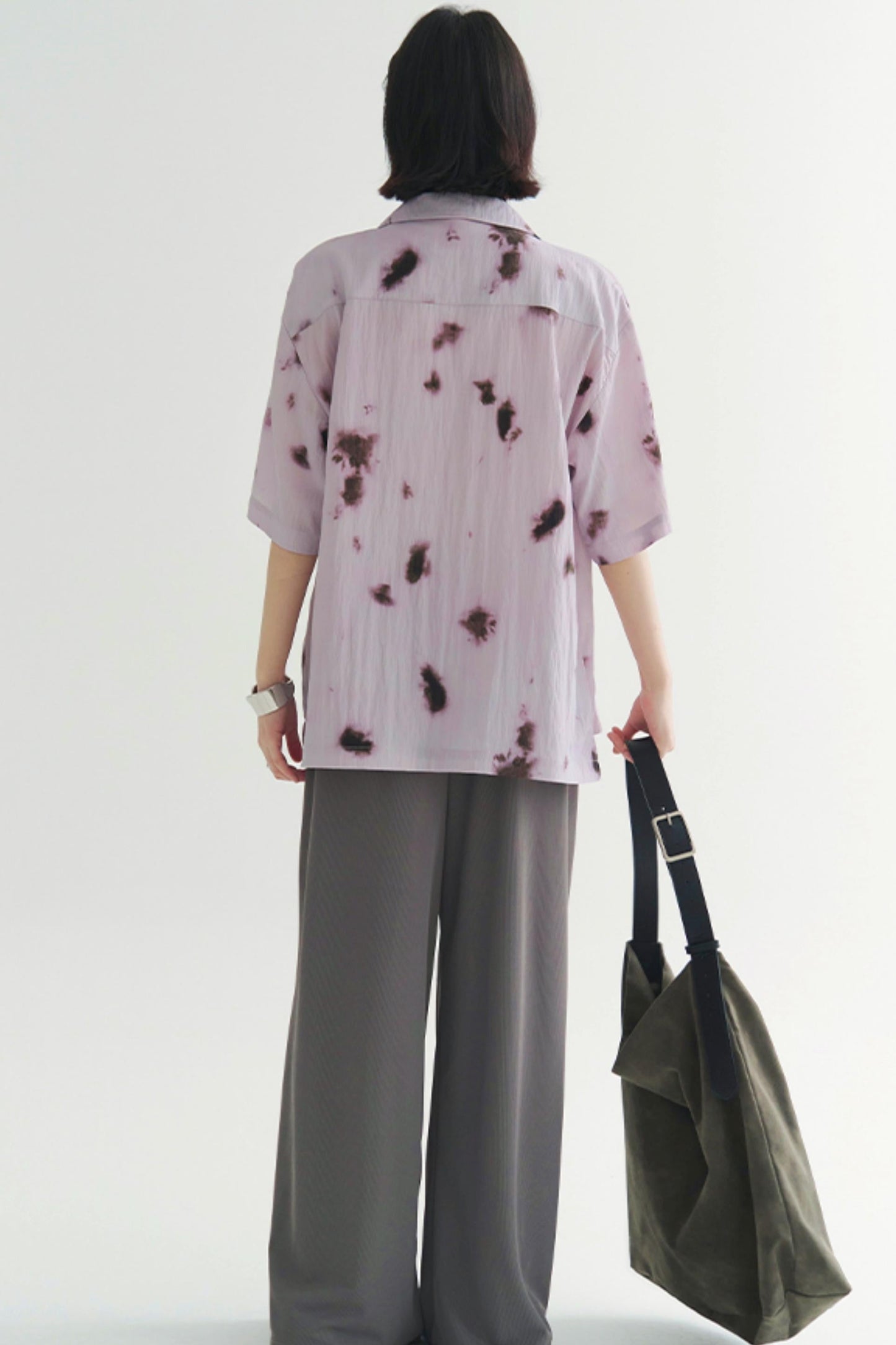 プリーツ風のソフトモーショントップス