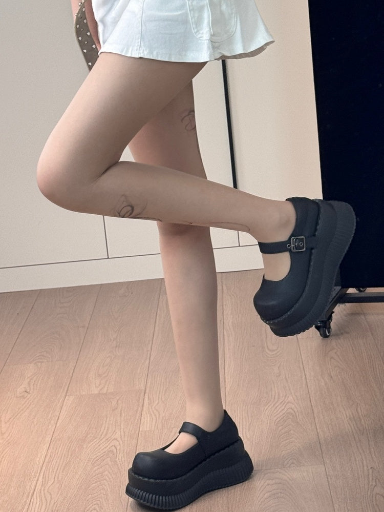 Hautfarbene Strumpfhose mit Schleife und Bittersüß-Print