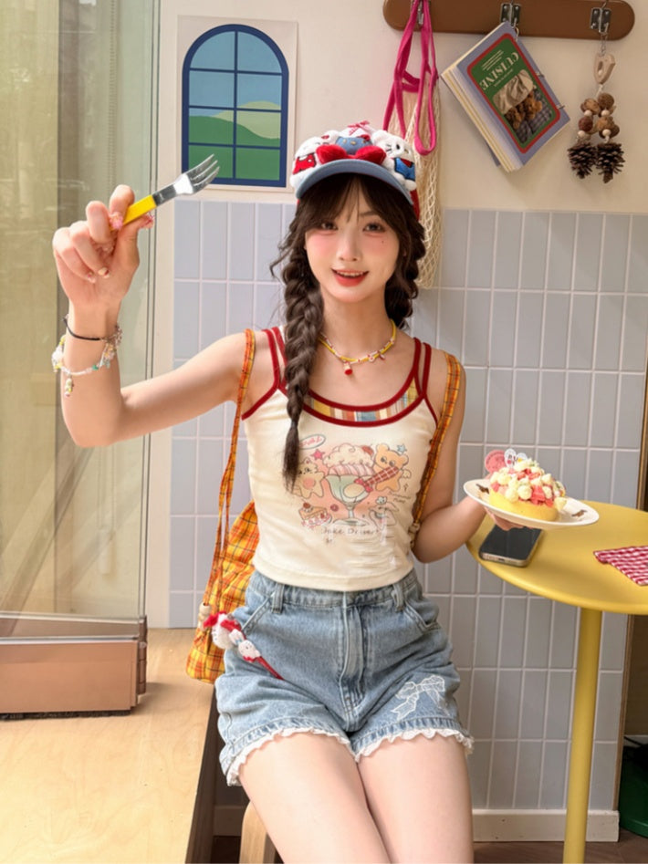 Blaue Jeansshorts mit Schleifenstickerei an den Bündchen und Spitzenbesatz