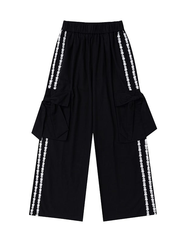 Hose mit floralen Schleifendetails und geradem Bein mit apricot/schwarzen Streifen und