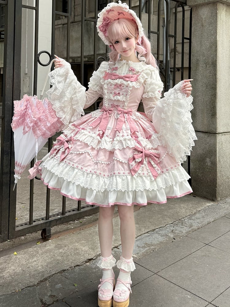 ピンクの袖のブラウス、ベル、長いリボン、レイヤードホワイト