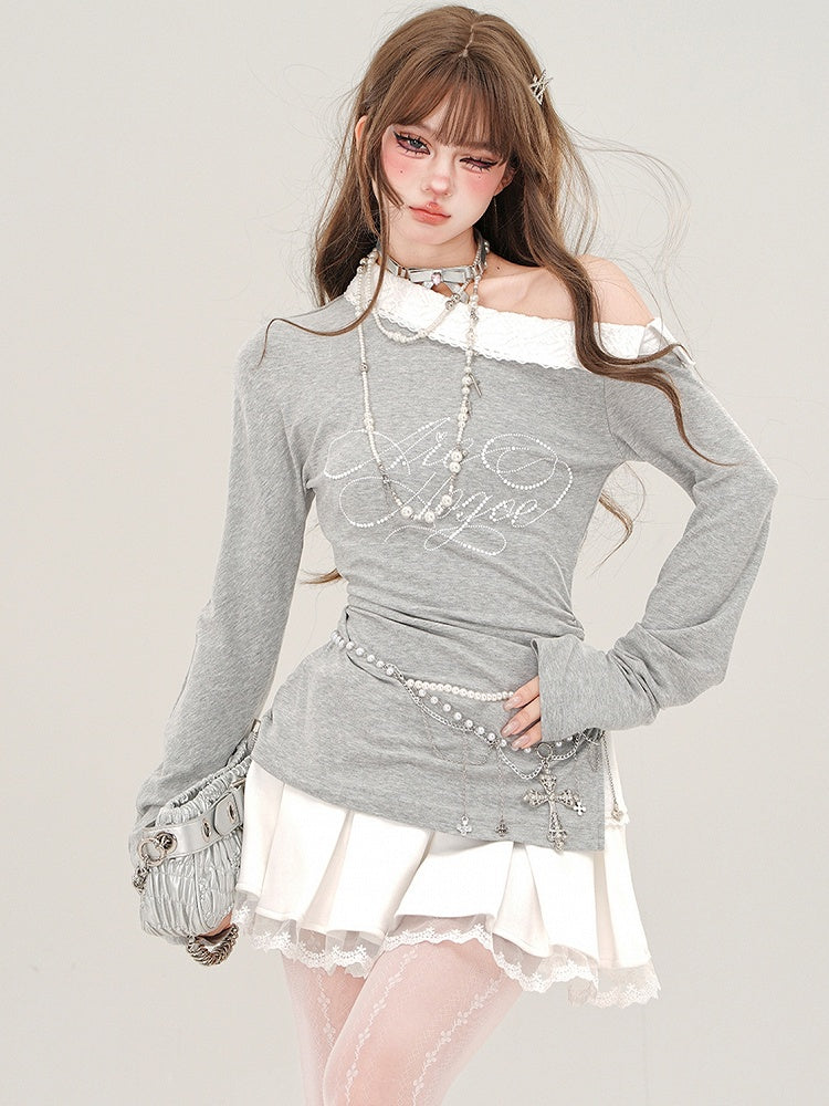 Grau/schwarzes Oberteil mit asymmetrischem Ausschnitt, Seitenschlitzen und langen Ärmeln