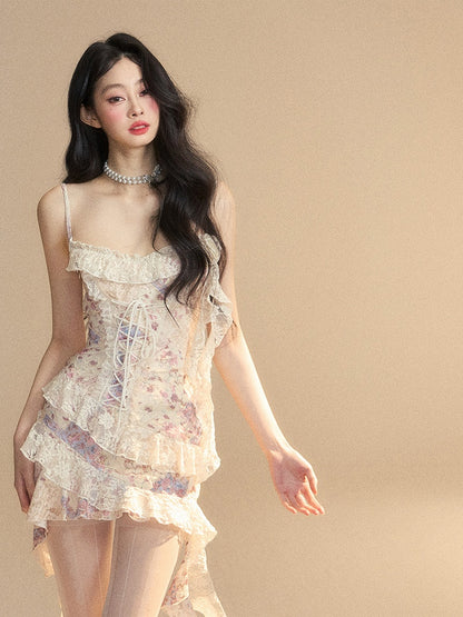 Kleid mit Schnürdetail am Saum, florales Apricot, Rüschen am Unterteil, asymmetrische Vorderseite