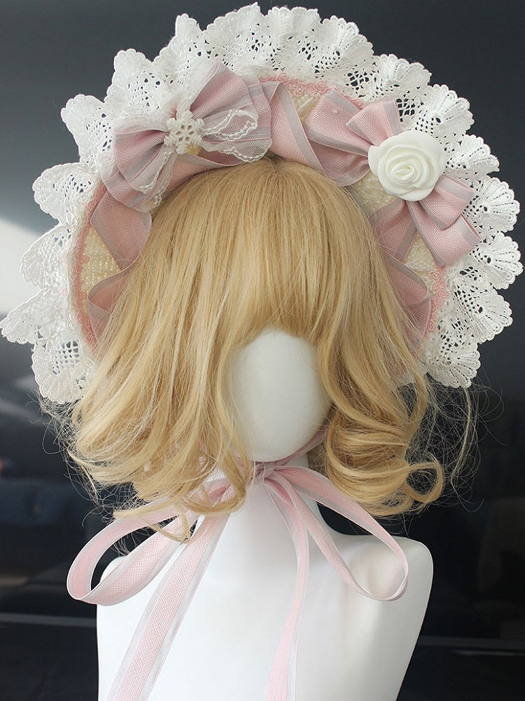 ピンク/ブルーの花柄リボンディテール、レーストリムのボンネット