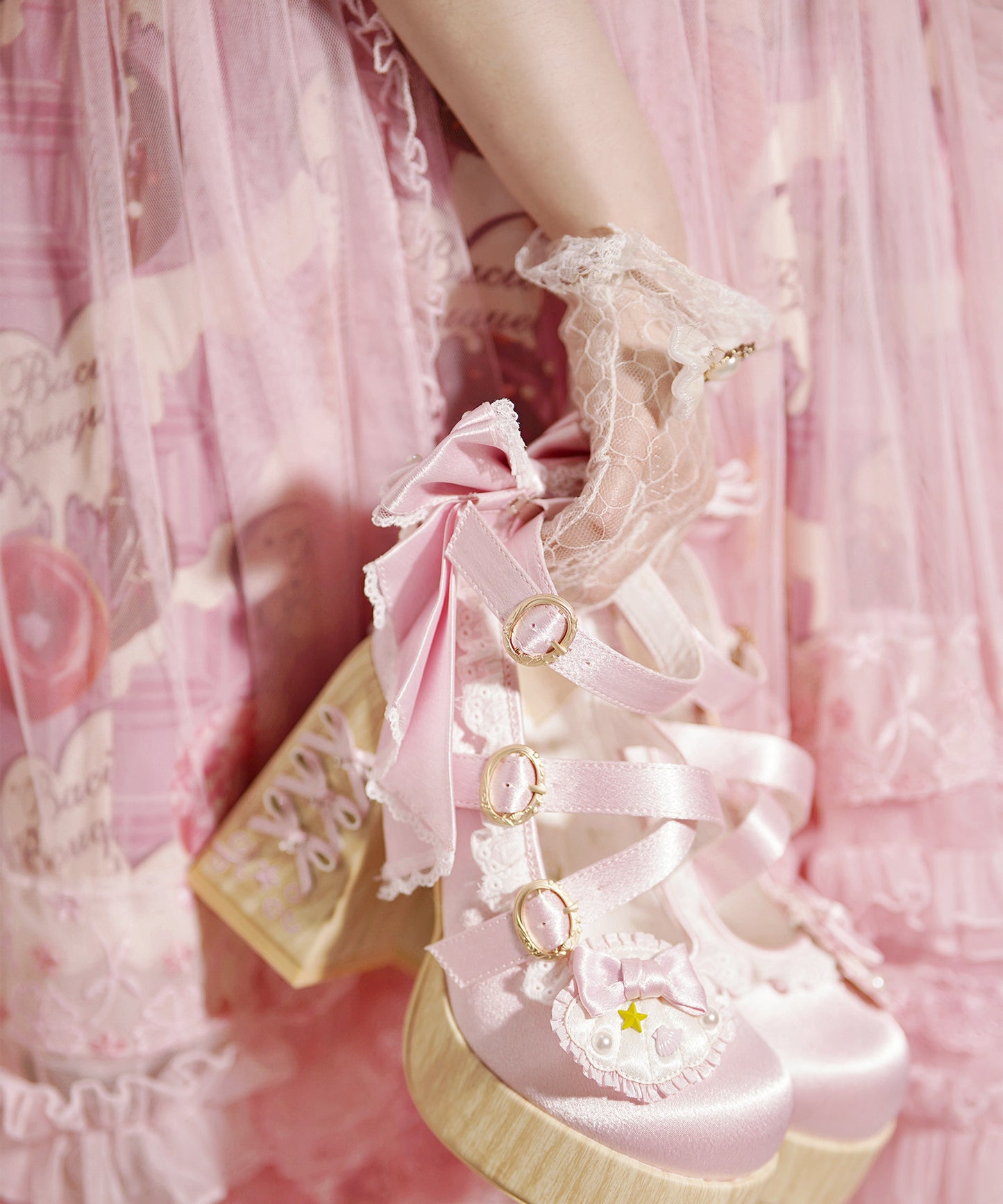 Pink Lolita platform heels styled with lace socks