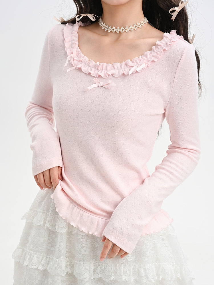 Rosafarbenes, langärmliges Oberteil mit Rüschenbesatz und Schleifendetails