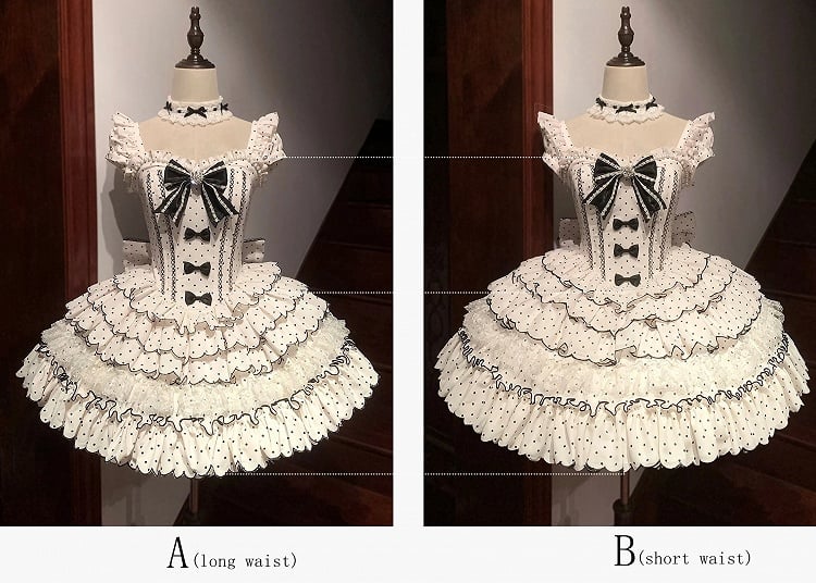 Gestufte schwarze Lolita-Taille mit Jakobsmuschelmuster und Tupfenmuster mit Kleiderbesatz und Prinzessinnensaum