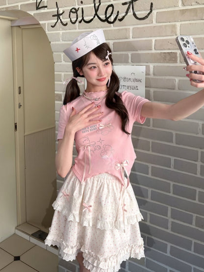 T-Shirt-Saum, gebogen, rosa Rüschen-Ausschnitt, Teddybär-Strasssteine, Schleifen-Akzente