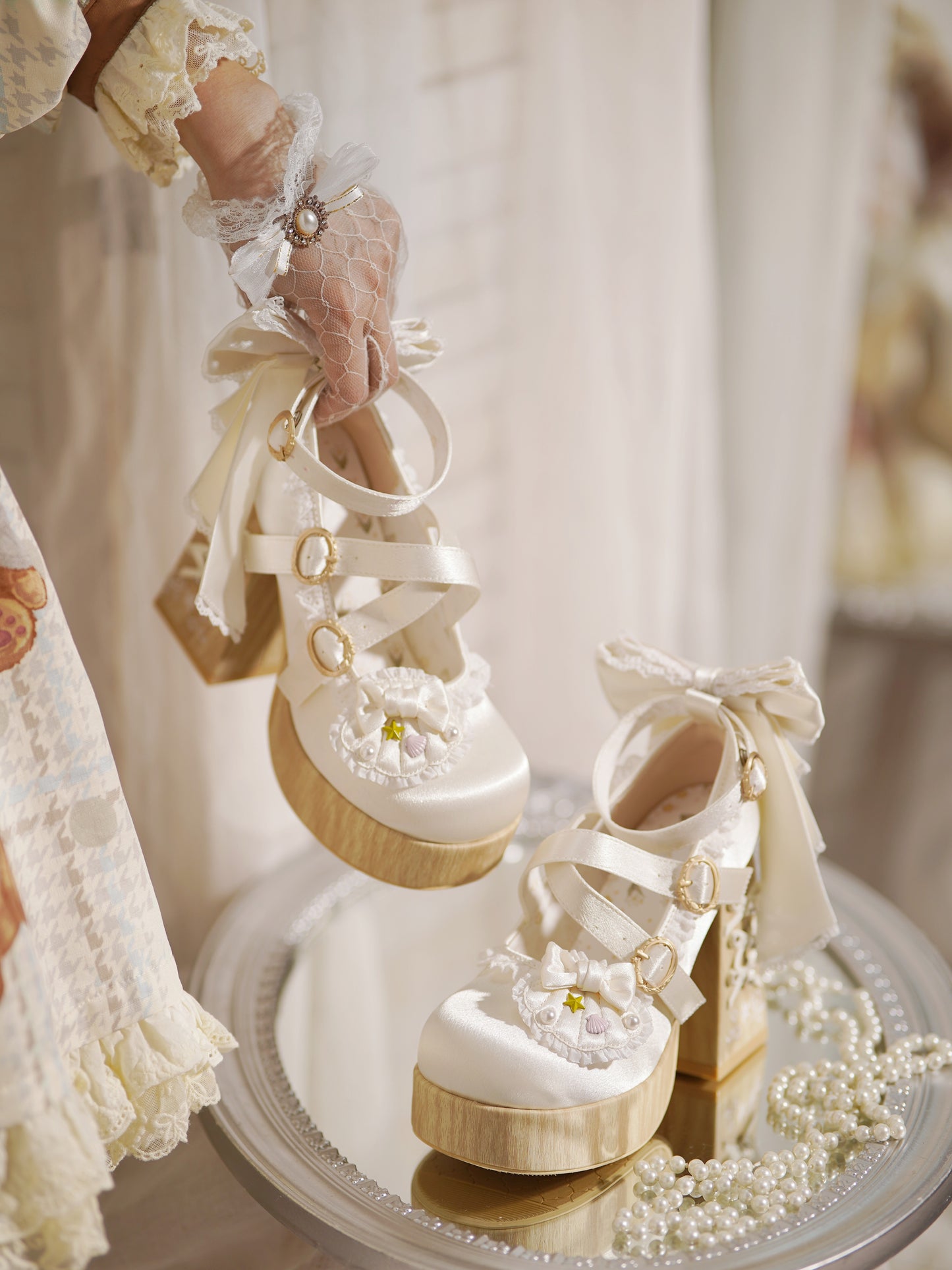 Ivory Lolita platform heels with bows and lace