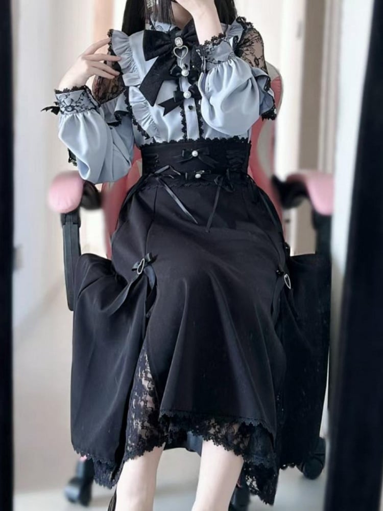 装飾されたビーズのジライブルーのトリムと蝶結びのディテール、フリル、ラインストーンのケイブラウス