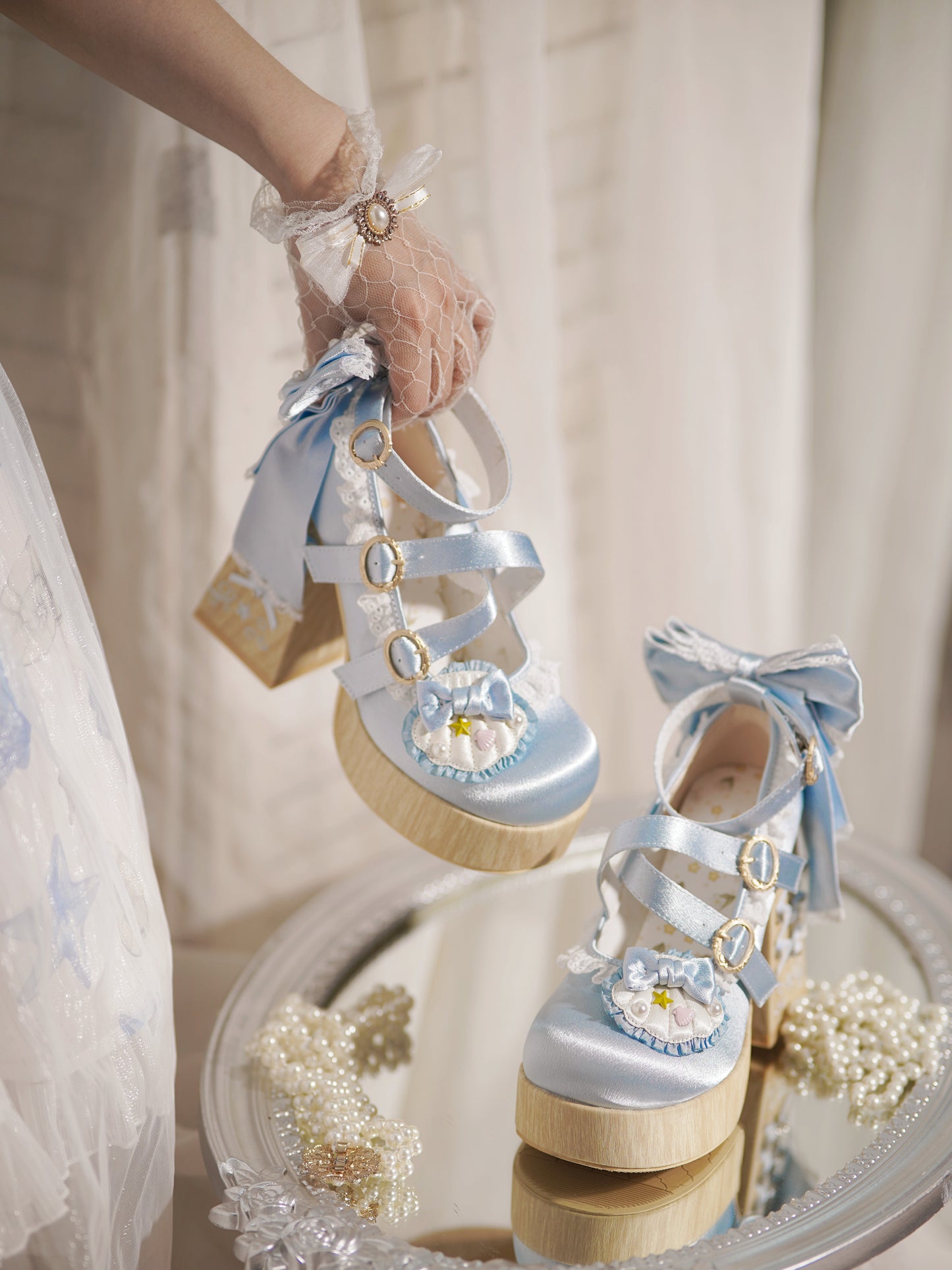 Blue Lolita platform heels with bows and lace