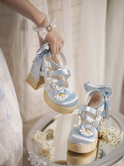 Blue Lolita platform heels with bows and lace