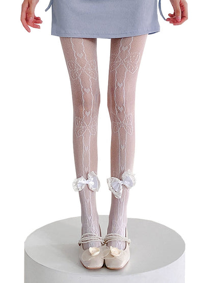 ブラック/ホワイト クリーミーホワイト リボン飾り 蝶結びとハートの網タイツ