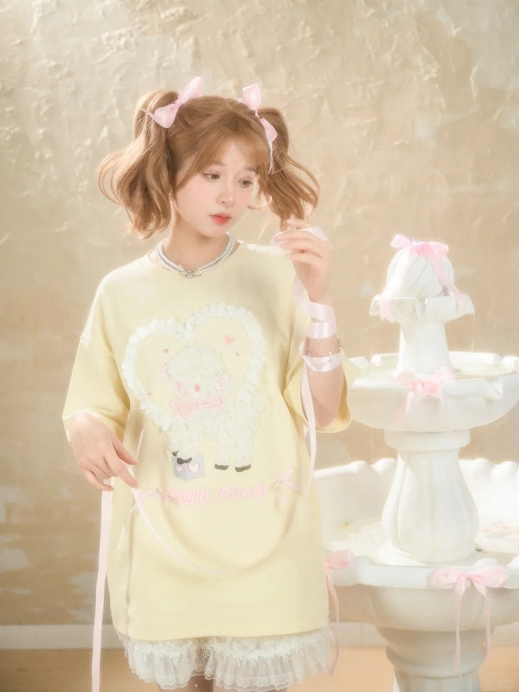 イエローのプラッシュラムアップリケフリルハートルーズTシャツクリーミー