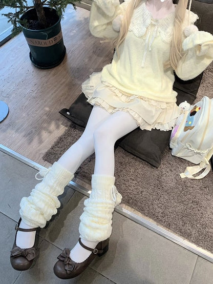 イエローのラウンドフラットカラーセーター+ホワイトカーディガン+ダブルトリプルレイヤー裏地付きスカート