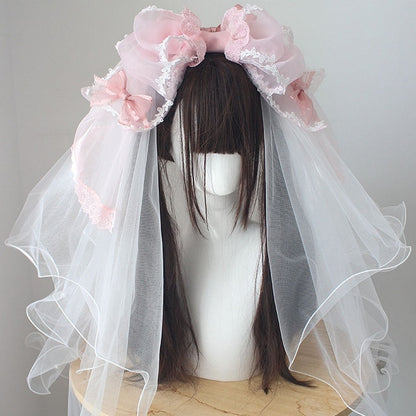 ピンクの蝶結びディテール、レーストリム、ベール付きKC
