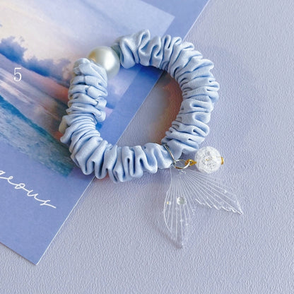 Perlenbesetzter 7 Meerjungfrau Charm Optionen Blaues Haargummi verziert
